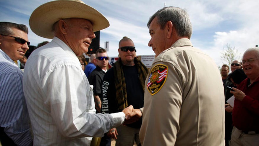 bundy and gillespie shaking hands.jpg